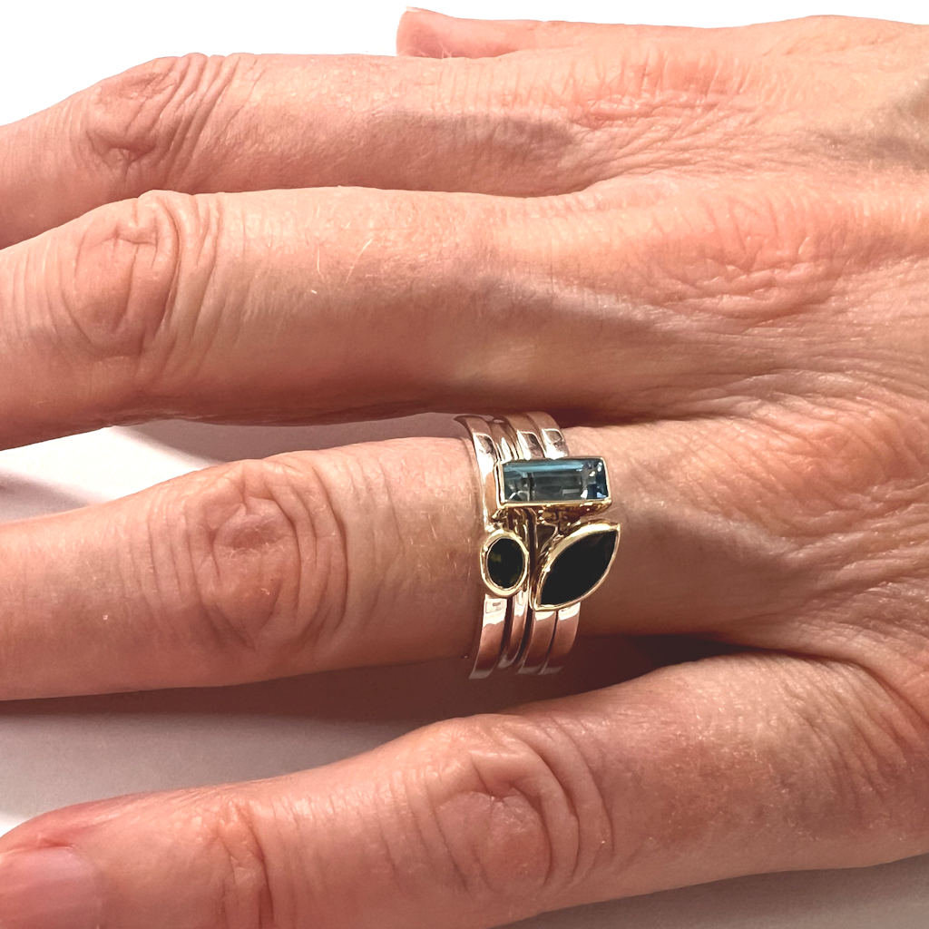 Set of Four Silver, Gold, Topaz, Iolite and Tourmaline Rings