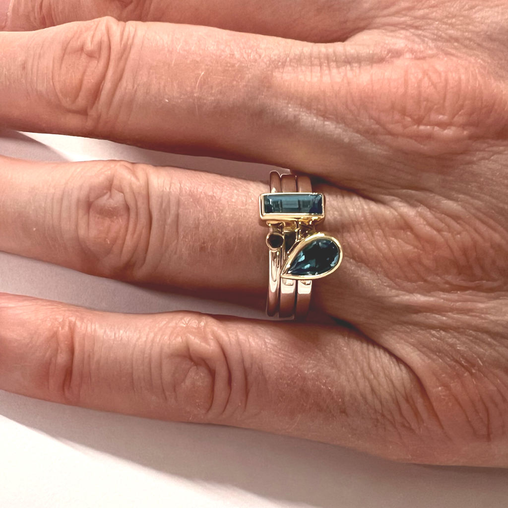 Set of Three Silver, Gold and Blue Topaz Rings